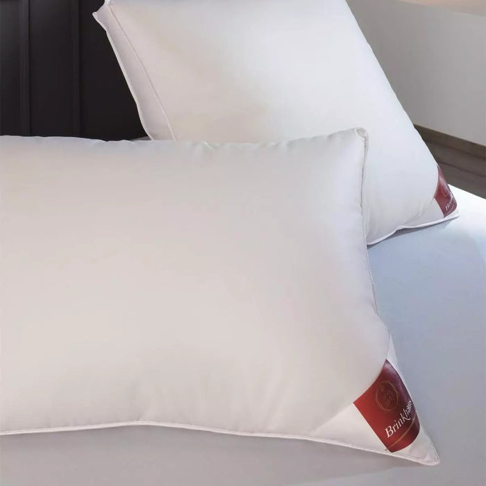 brinkhaus celeste pillows on a bed