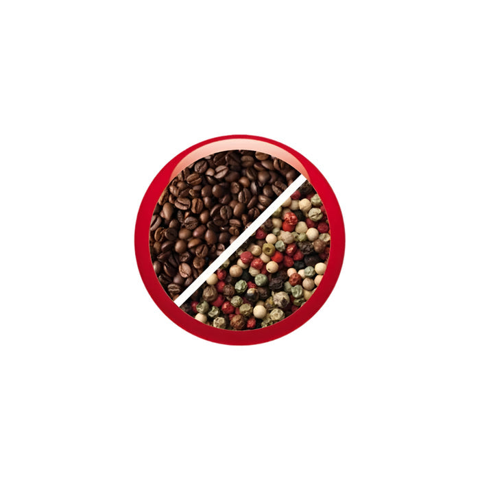 Red bowl with coffee beans and various spices on a white background