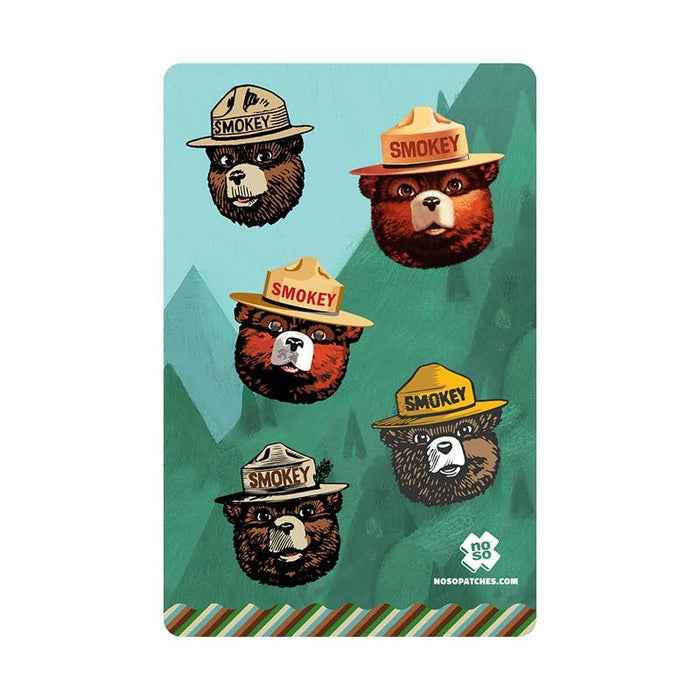 Forager Provisions LTD Smokey Bear Dazzits x NoSo brushed polyester repair patches on a green mountain background