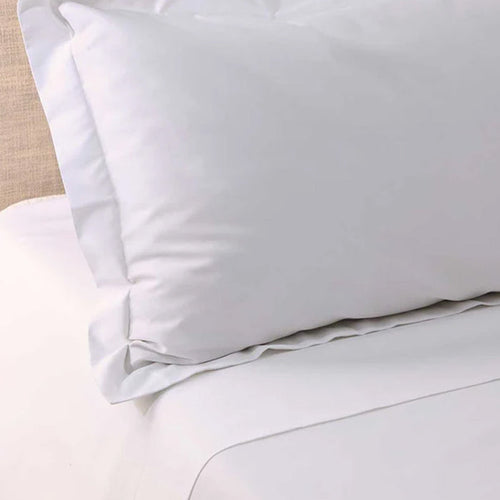 Close-up of 500TC Egyptian White Cotton Flat Sheet on a bed with a neutral background