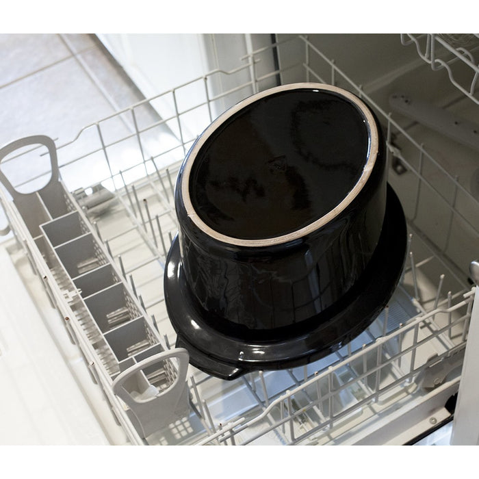 Inner ceramic pot is placed inside a dishwasher rack.