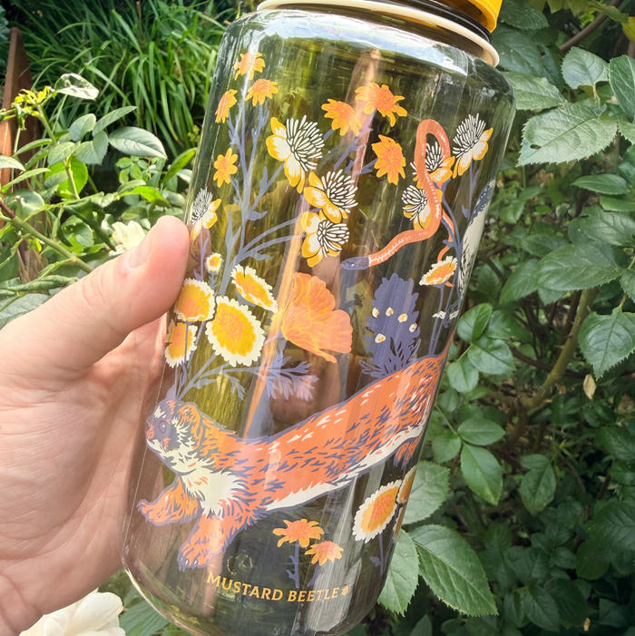 Mustard Beetle Nalgene 32oz Carrizo Plain: garden scene with yellow flowers, orange animal, and logo on the bottle.