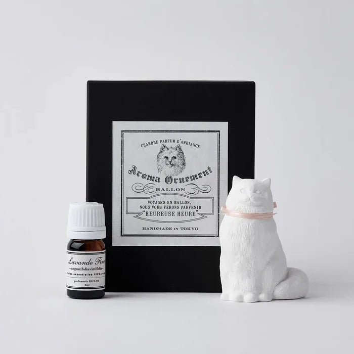Handmade Tokyo plaster chiffon cat aroma oil diffuser ornament, pink ribbon accent, elegant in black gift box, perfect decor.