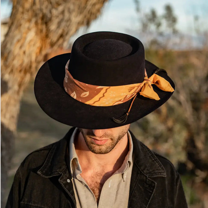 Forager Provisions LTD Bandits Bandanas Free Spirit organic cotton bandana tied around a black felt hat on a man