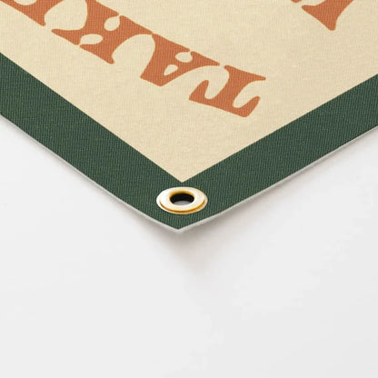 Close-up of Benoit’s Design Co felt banner, "Take A Walk On The Wild Side", green border, metal grommet, stylish room decor.