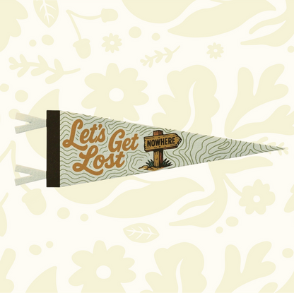 Benoit’s Let’s Get Lost Pennant 8x28.5” brings retro camp flag decor to your wall; perfect vintage touch for home styling.
