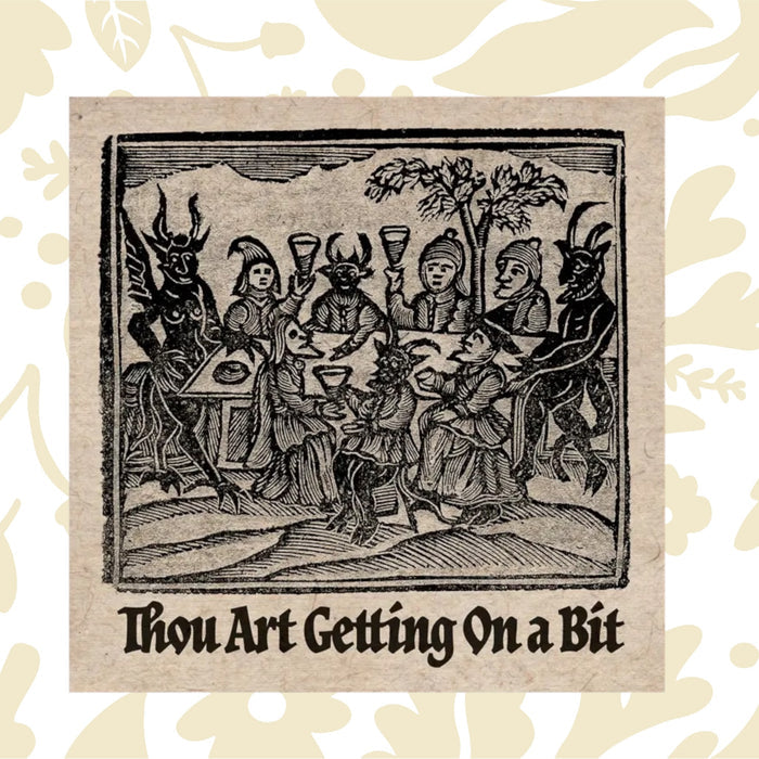 Betiobca medieval birthday card with horned creatures, “Thou Art Getting On A Bit” joke. Funny vintage greeting design.