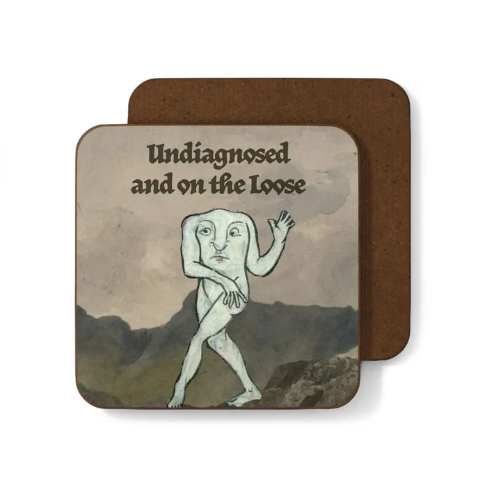 The Betiobca Undiagnosed and On the Loose Coaster shows a surreal figure with torso face art and bold lettering, unique gift idea.