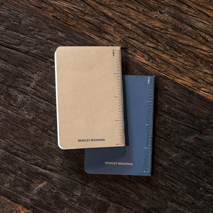 Bradley Mountain Pocket Journals 2 Pack in Blue, ideal for daily carry, displayed on rustic wood for stylish organization.