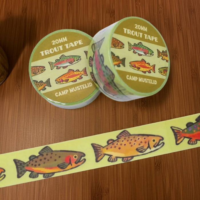 Camp Mustelid Trout Washi Tape rolls for journaling, crafts, scrapbooking. Nature-themed, decorative adhesive tape.