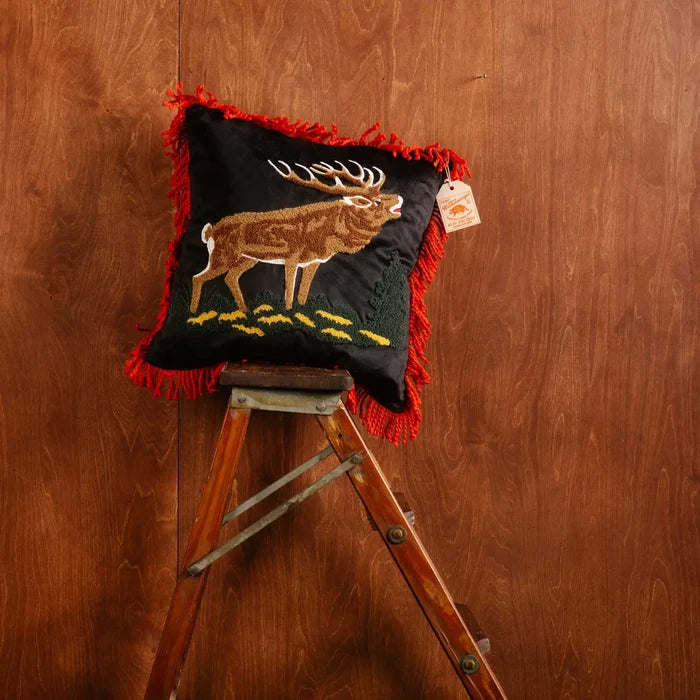Peking Camp Wandawega Elk Pillow 18x18 with rustic lodge style, shown on a step ladder for cabin home décor inspiration.