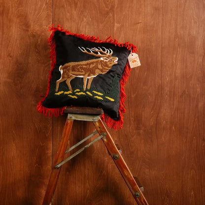 Peking Camp Wandawega Elk Pillow 18x18 with rustic lodge style, shown on a step ladder for cabin home décor inspiration.
