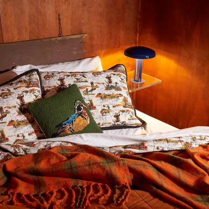 Cozy bed with Peking Camp Wandawega Wood Duck Hook Pillow 14x14, plush pillows, and soft blanket for bedroom decor.