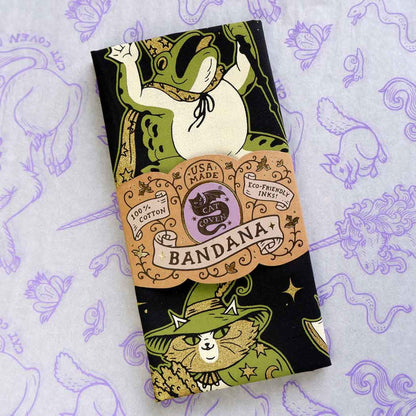 Forager Provisions LTD Cat Coven Join Our Quest cotton bandana featuring whimsical frog and cat wizard illustrations.