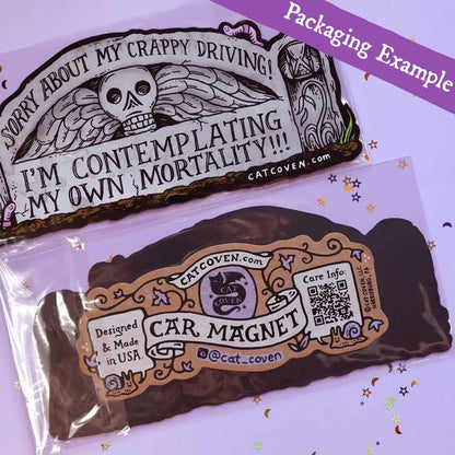 Forager Provisions LTD Cat Coven Mortality car magnet with a gothic skull design and humorous text in packaging.