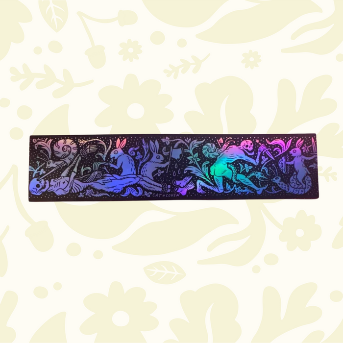 Forager Provisions LTD Cat Coven holographic vinyl sticker featuring a gothic rabbits vs skeletons forest scene