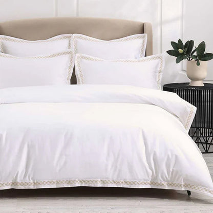Cavendish Gold Duvet Cover Set on a bed in a bedroom setting.