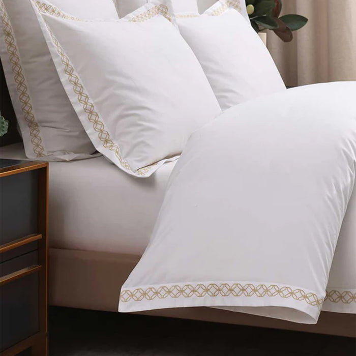 Cavendish Gold Duvet Cover Set on a bed in a bedroom setting.