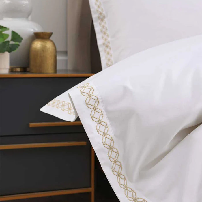 Cavendish Gold Duvet Cover Set on a bed in a bedroom setting.