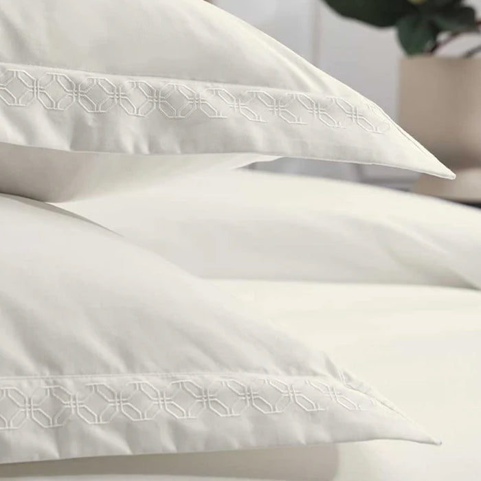 Cavendish Latte Pillowcase on a neutral background