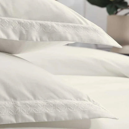 Cavendish Latte Pillowcase on a neutral background