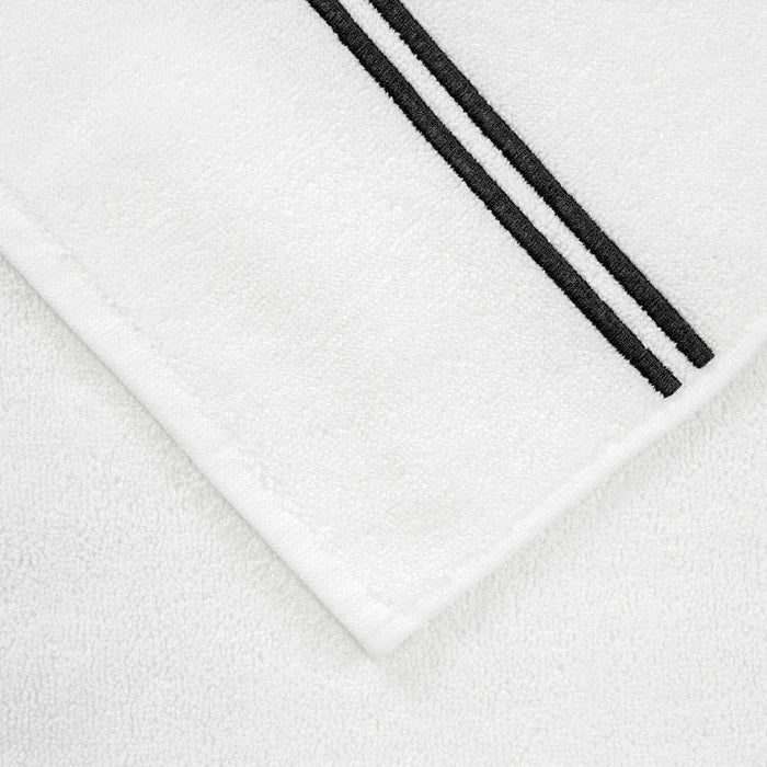 close up of the fabric and details of the white grey classic bath towel
