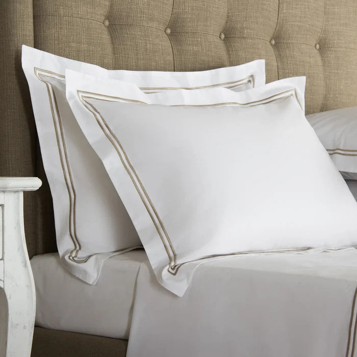 side view of classic pillowcase sham white khaki  on a bed