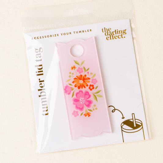 The Dainty Floral Pink Tumbler Lid Tag by the-darling-effect features a colorful floral design, cup and straw illustration, and is packaged in clear plastic—perfect for your tumbler accessories collection.