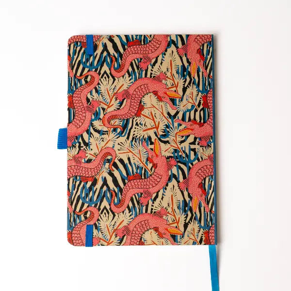 Denik Layflat Notebook: pink dragon animal print, blue foliage, beige cover, blue ribbon. Hardbound stylish journal gift.