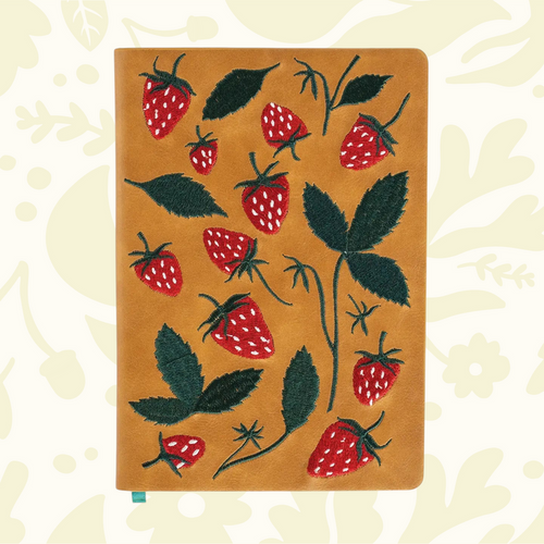 Forager Provisions LTD Denik Folk Elana’s Berries journal with raised red strawberry and green leaf embroidery on tan cover