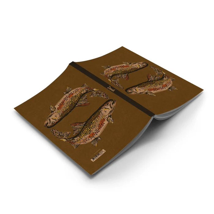 The Denik Trout Kraft Classic Layflat Notebook with two trout design, open face down, displayed on a clean white surface.