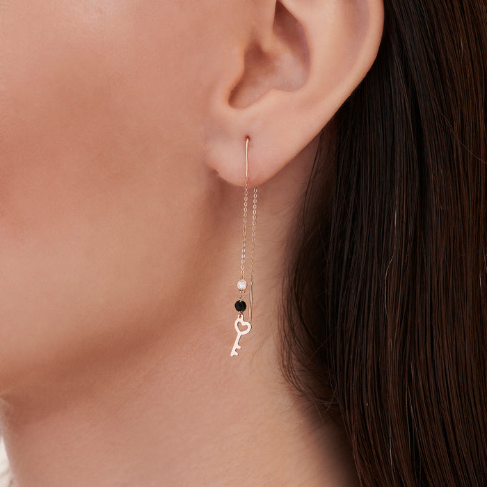 Diamantohrring mit Spinell Stein