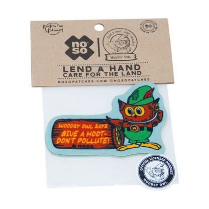 Forager Provisions LTD Woodsy Owl Don't Pollute peel-and-stick repair patch in a branded cardboard display package.