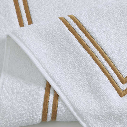 Empire Bath Mat White Gold on a white background