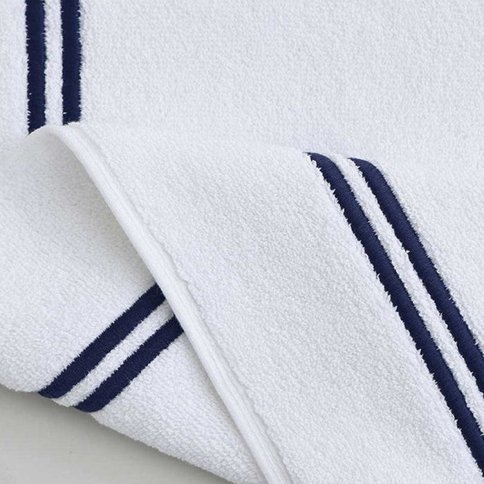 Empire Bath Mat White Navy on a light gray background