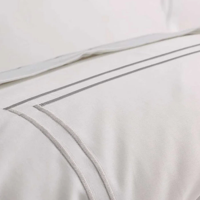 Close-up of Empire Silver Duvet Cover set on a plain background