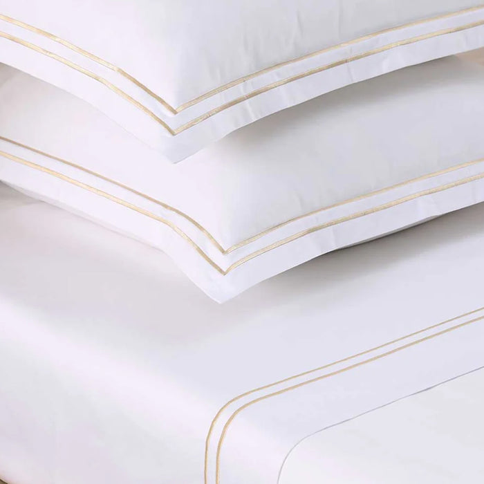 Close-up of Empire Champagne Flat Sheet on a white background