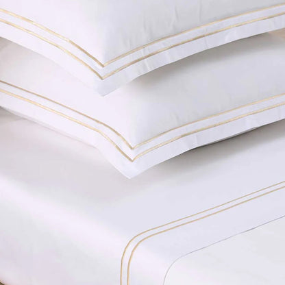Close-up of Empire Champagne Flat Sheet on a white background