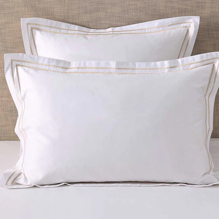 Empire Champagne Pillowcases on a neutral background