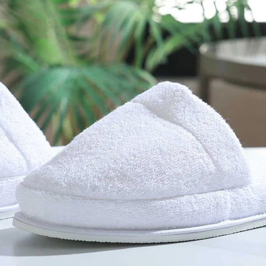 Empire Slippers White on a blurred background