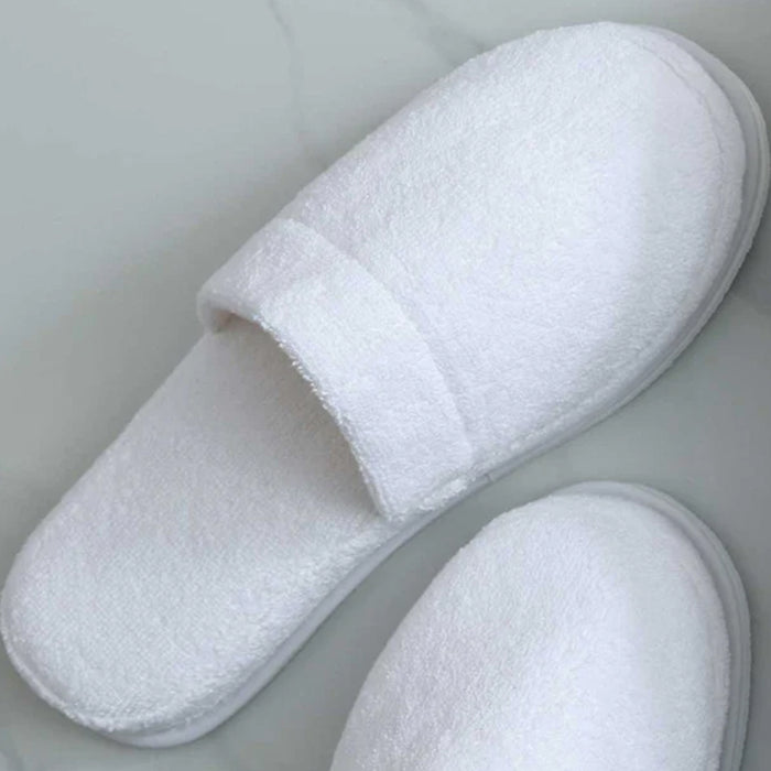 Pair of Empire Slippers White on a light gray background