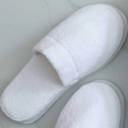 Pair of Empire Slippers White on a light gray background