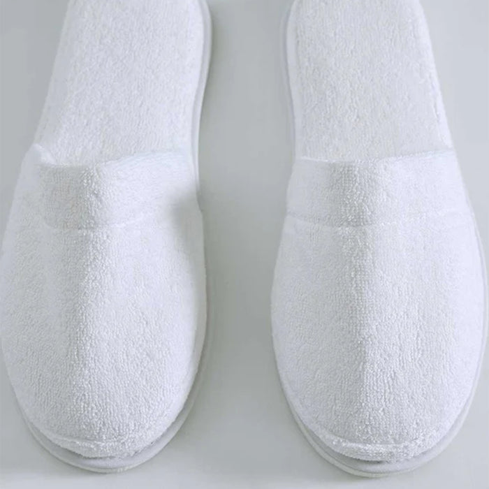 Pair of Empire Slippers White on a light gray background
