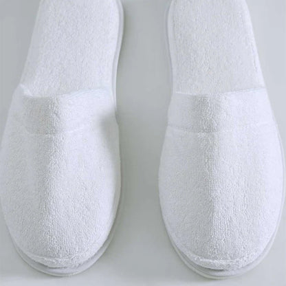 Pair of Empire Slippers White on a light gray background