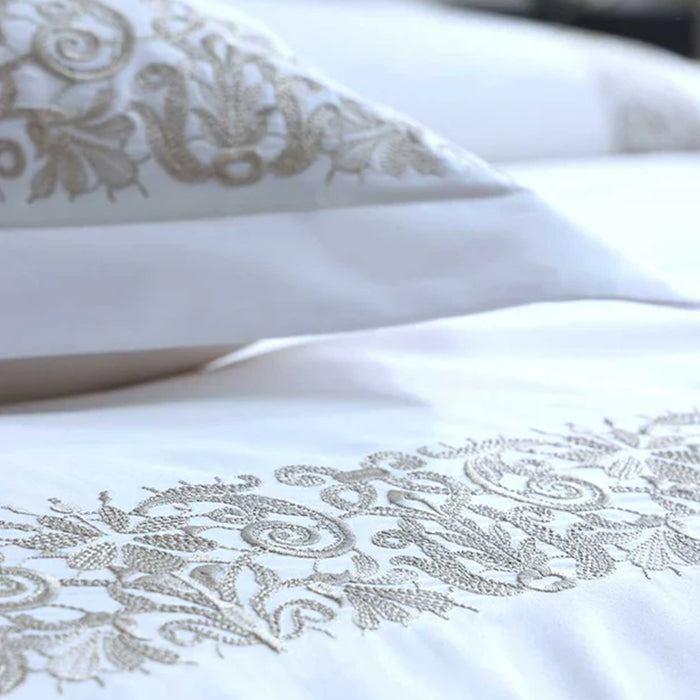 Fion Taupe Duvet Cover Set on a soft focus background