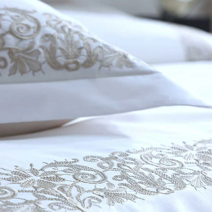 Fion Taupe Pillowcase on a soft focus background