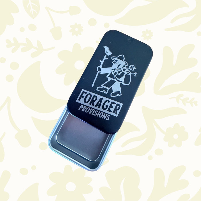 Forager Provisions LTD metal stash tin with a black sliding lid featuring a white Forager Provisions logo graphic.