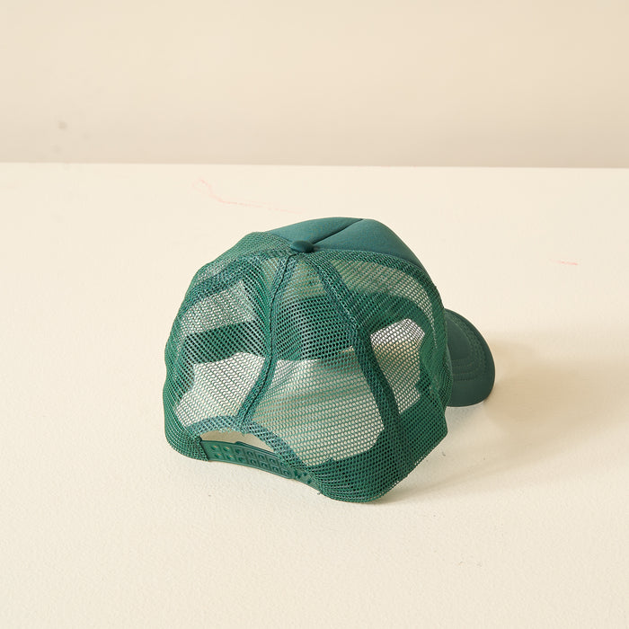 The Darling Effect's Green Game Day Trucker Hat features a solid fabric front, mesh back panel, and is ideal for showing team spirit on game day.