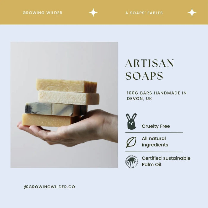 Forager Provisions LTD Growing Wilder artisan soap bars stacked in a hand, featuring natural oats and honey ingredients.