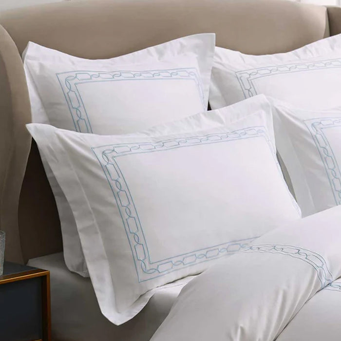 Hamilton Light Blue Pillowcase on a beige sofa